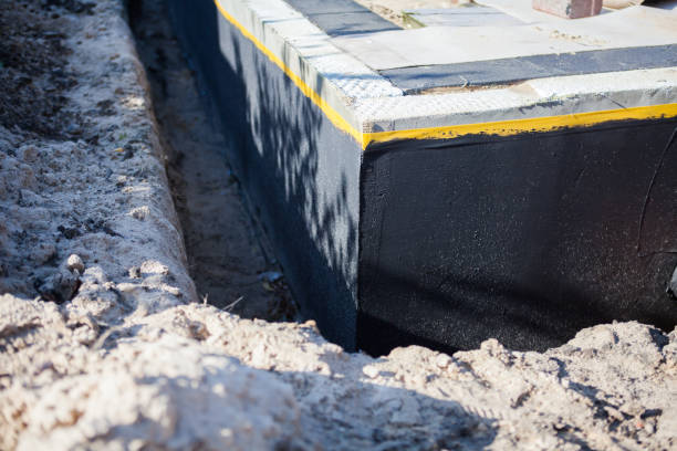 Professional Waterproofing technician working in Bellona, NY